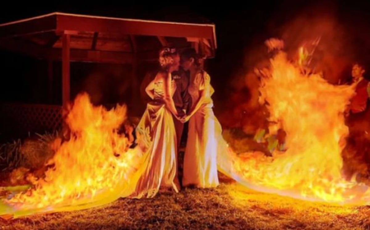 Querían una foto de bodas con más adrenalina y prendieron fuego sus vestidos