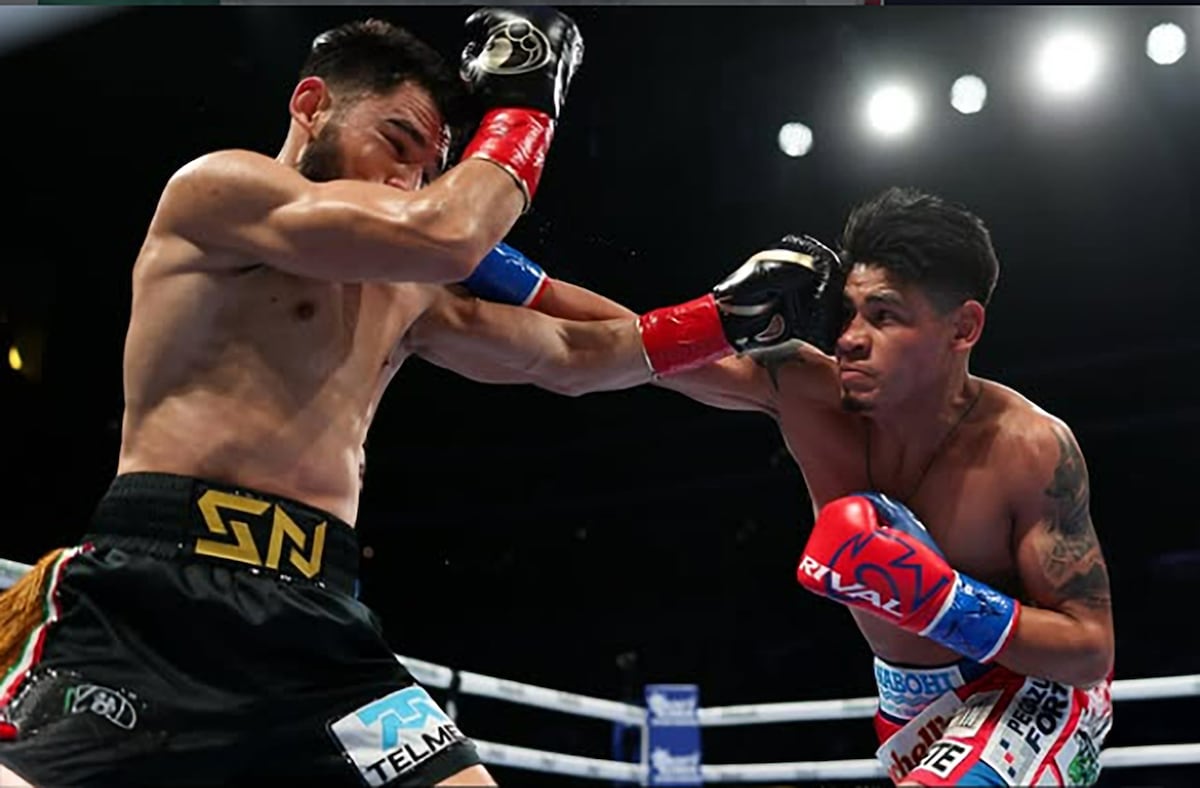 ‘Vaquero’ Navarrete unifica superplumas con TKO a ‘Sugar’ Núñez en 11 rounds