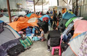 Migrantes varados en la frontera mexicana con Estados Unidos viven una Navidad entre la esperanza y la nostalgia