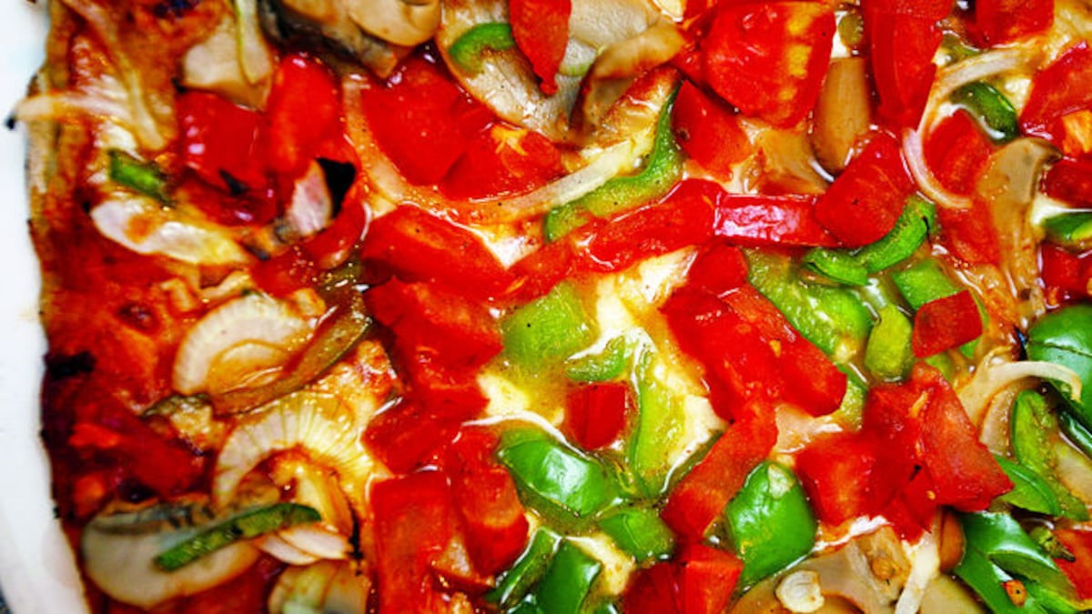 Repartidor podría pasar 18 años en la cárcel por escupir a pizza de cliente